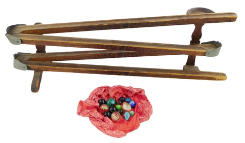 Marble run game and assorted marbles, including: marble track, wood and metal, black painted foliate