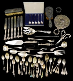 STERLING: Assortment of sterling and silver flatware, serving pieces, and vanity items, all marked