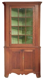 Corner cupboard, American, 19th C., cherry, two parts, flat molded edge top over single twelve pane