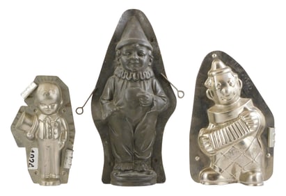 CHOCOLATE MOLDS: Anton Reiche, etc., three larger figural molds including two clowns and one