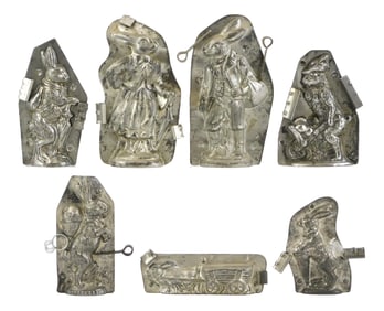 CHOCOLATE MOLDS: H. Walter, etc., seven Easter themed molds, including: largest a pair of Bavarian