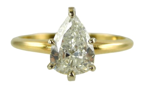 JEWELRY: 14K Diamond engagement ring, set with one Pear brilliant cut natural diamond, approximately