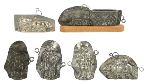 CHOCOLATE MOLDS: F. W. Kutzscher, etc., six pig-themed chocolate molds, including: three