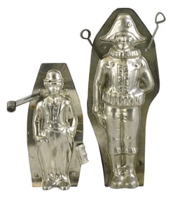 CHOCOLATE MOLDS: Two figural pieces: Charlie Chaplin 'The Tramp' and standing jester, 20th C.,