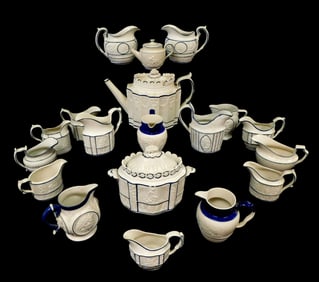 Castleford-type creamware with blue glaze trim, 19th C., nineteen pieces including: teapot, lidded