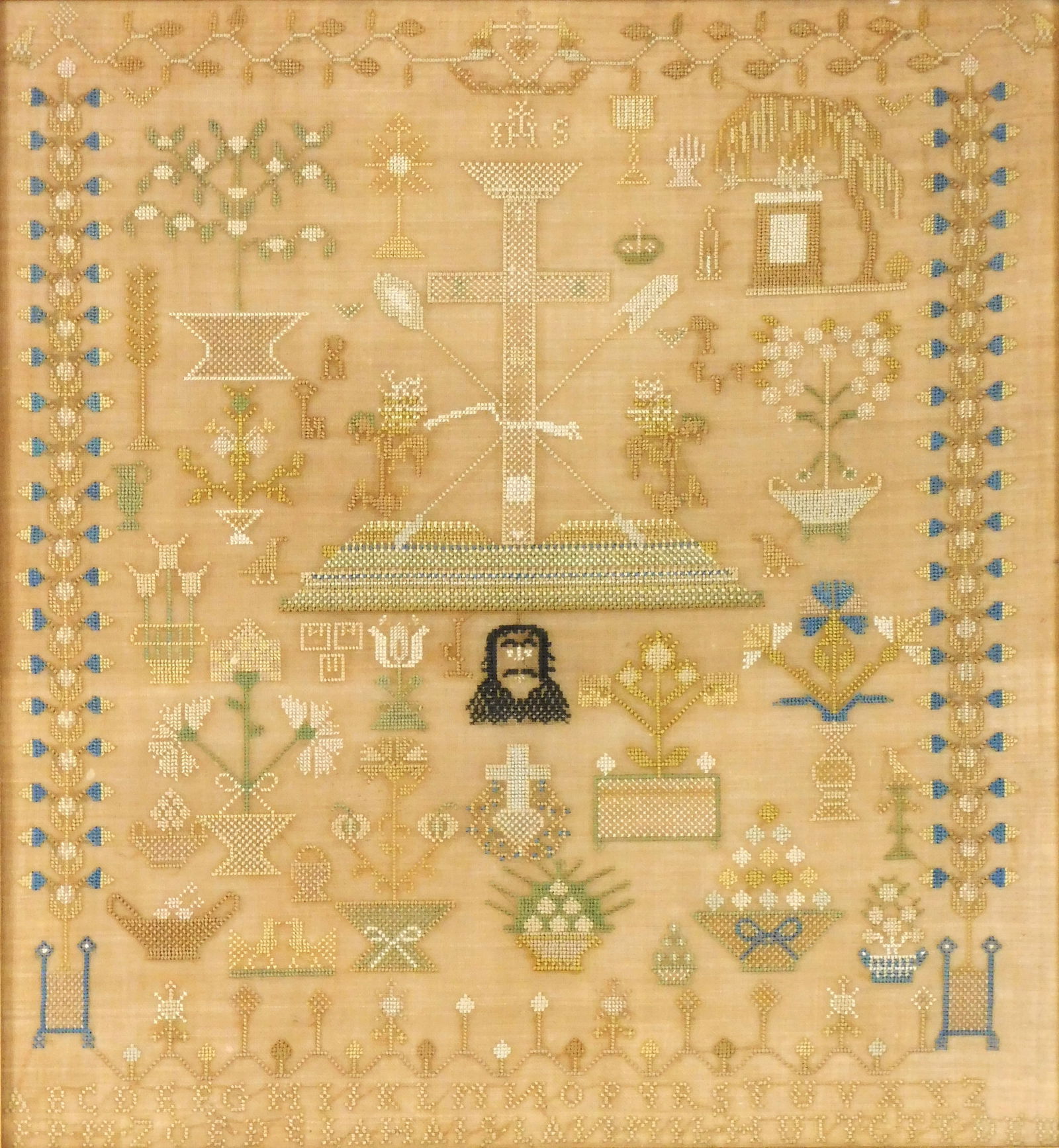 SAMPLER: Continental sampler, likely Dutch, silk on linen, central cross decoration with "IHS" at (1 of 2)