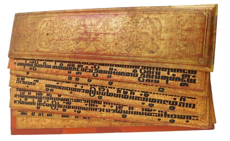 ASIAN: Red, black, and gilt lacquer Buddhist manuscript and cover, Burmese, probably 19th C.,