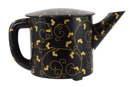 ASIAN: Lacquer teapot, Japanese, Edo/Meiji period, scrolling gold leaf and vine on black ground,