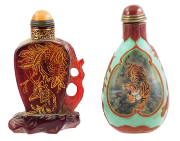 ASIAN: Two Chinese snuff bottles, 20th C.: one Peking glass with inside painted images of tigers to