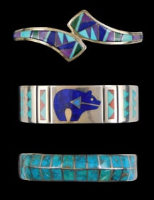 JEWELRY: Three Southwest silver cuff bracelets, all with Zuni style inlay, one featuring a spirit