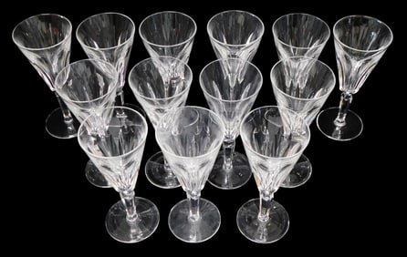 GLASS: Waterford crystal fluted champagne stemware, "Sheila" pattern, thirteen pieces, six cut