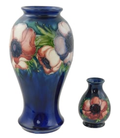 ART POTTERY: Moorcroft, two pieces in "Anemone" pattern, floral pattern on blue ground, taller vase