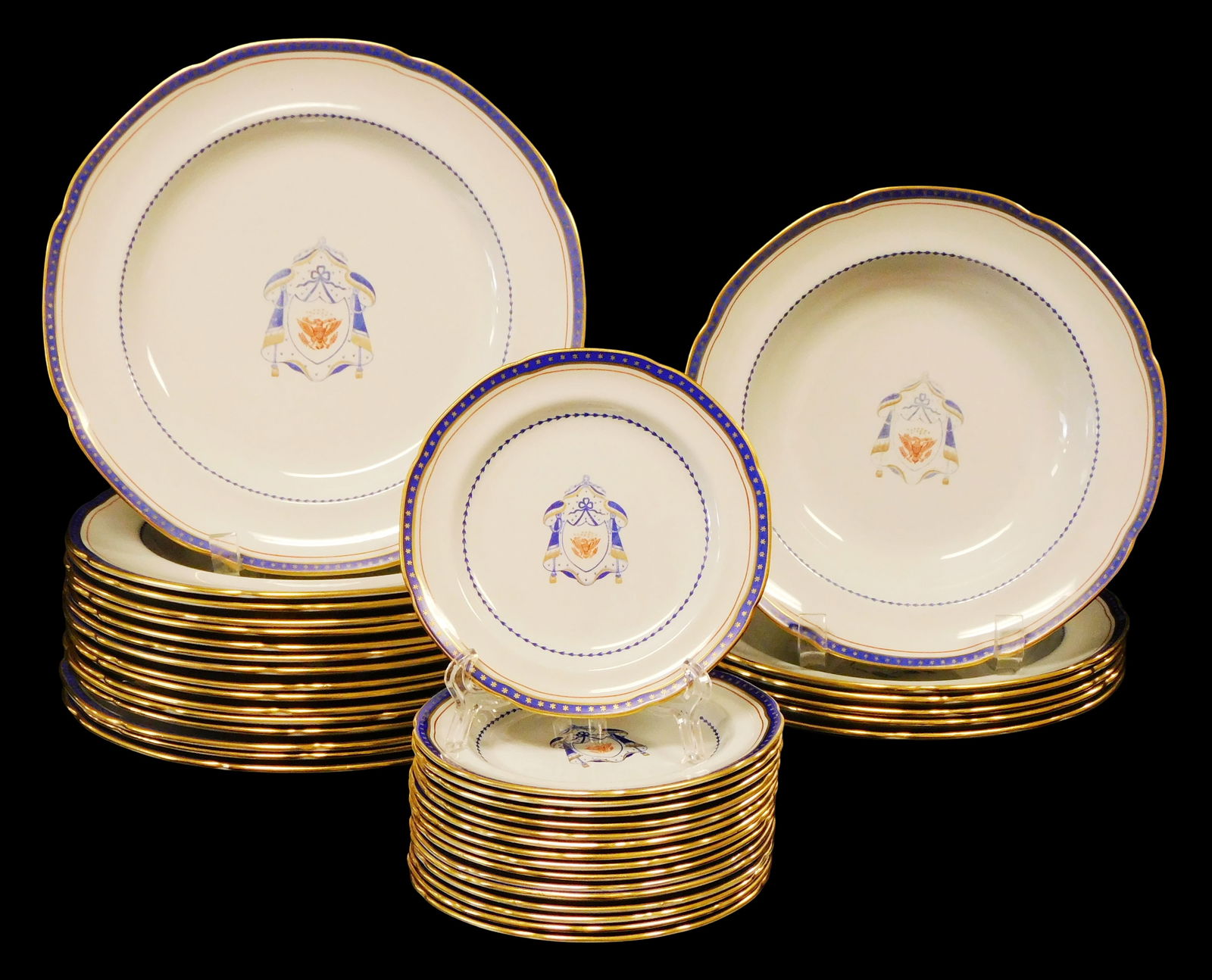 CHINA: Copeland Spode "New Stone" partial dinnerware set, thirty-eight pieces, decorated with blue: CHINA: Copeland Spode "New Stone" partial dinnerware set, thirty-eight pieces, decorated with blue Armorial design in the manner of Chinese Export porcelain, pieces include: sixteen dinner plates, 10