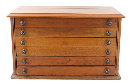 Spool cabinet, American, late 19th - mid 20th C., oak case, rectangular form with bank of six long