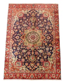 RUG: Tabriz, 7' x 5', wool on cotton, finely woven, central medallion on a navy ground, red primary