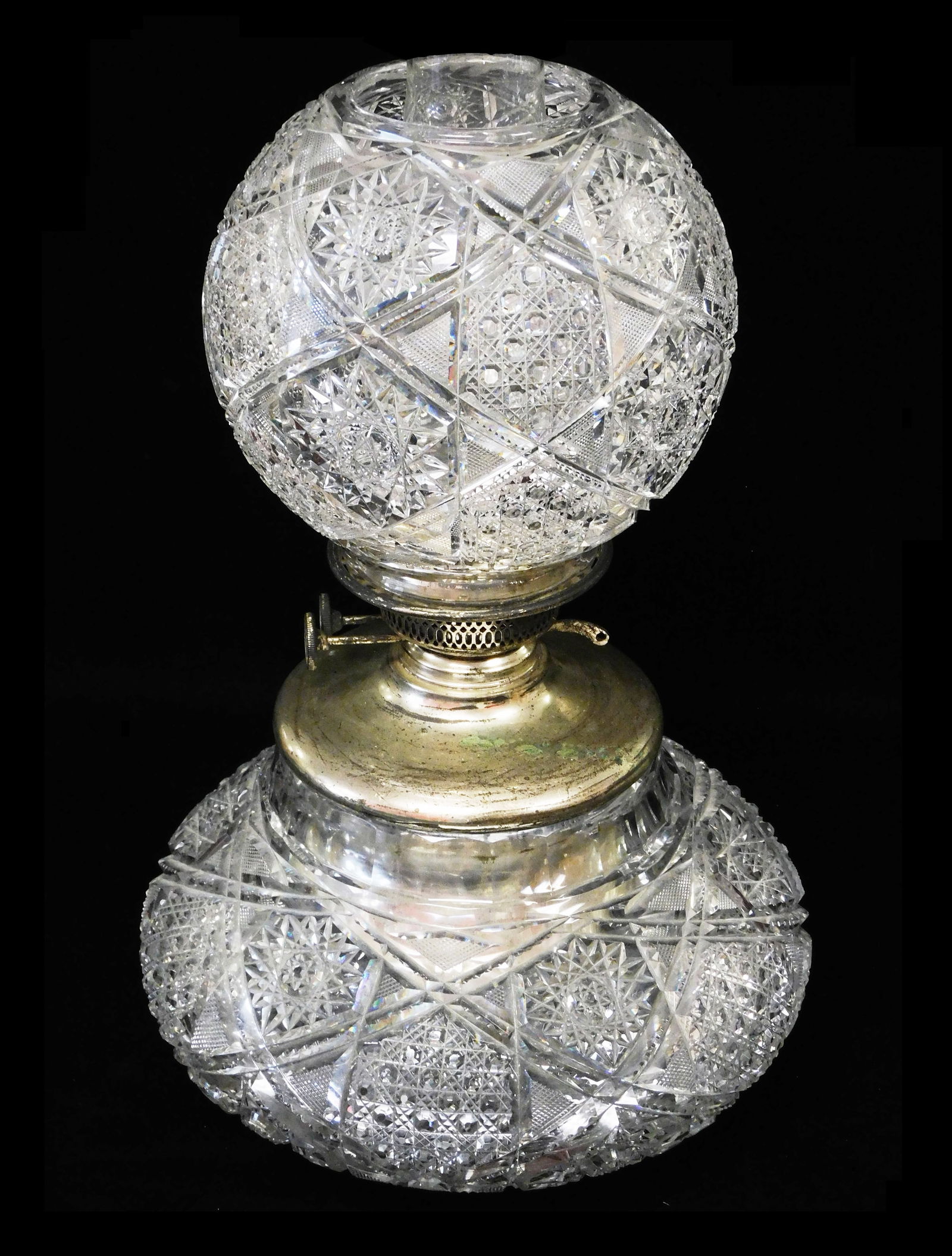 Dorflinger Brilliant Cut oil lamp, pattern 99, lead crystal with vivid color, thick and heavy glass: Dorflinger Brilliant Cut oil lamp, pattern 99, lead crystal with vivid color, thick and heavy 12" diam. glass base, base and shade both with deeply cut decoration, fluted neck, silvered metal insert s