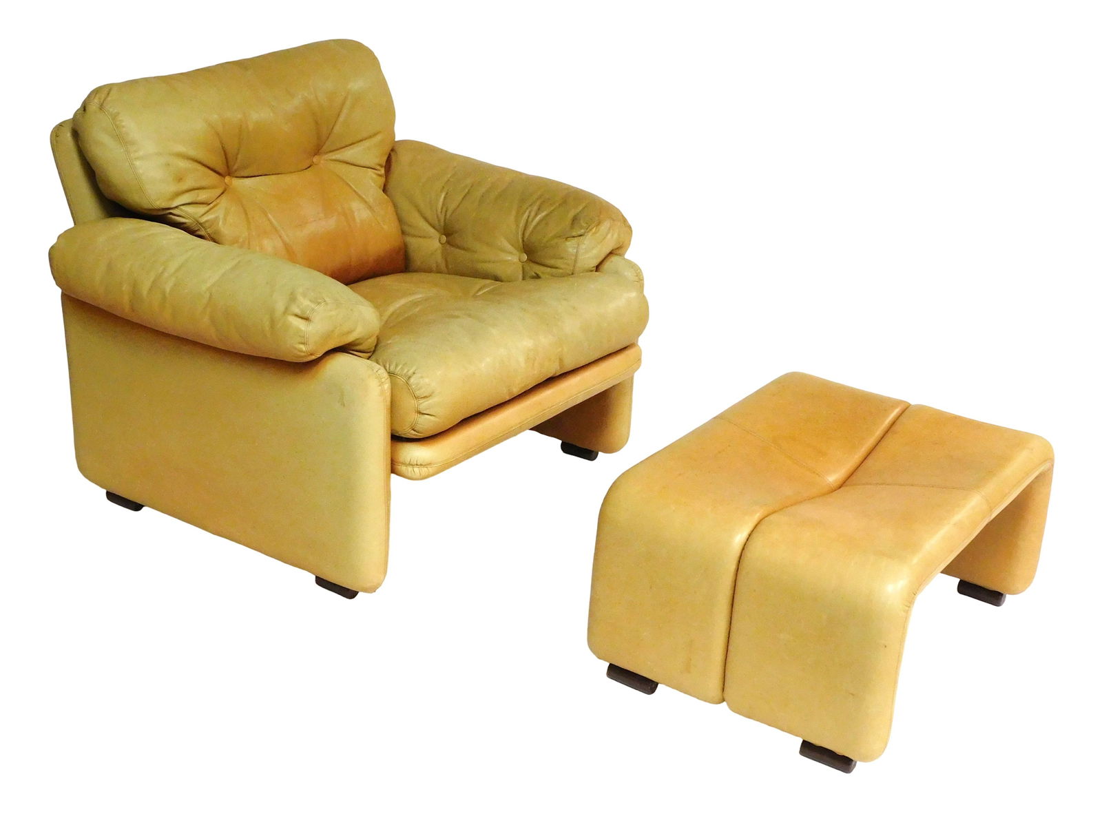 Tobia Scarpa for C & B Italia, Coronado Series, leather lounge chair in warm caramel, original tags: Tobia Scarpa for C & B Italia, Coronado Series, leather lounge chair in warm caramel, original tags to seat, noticeable sun-fade, 29" h. x 40" w. x 35" d.; along with matching ottoman, 27 1/4" l., bot