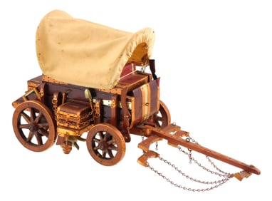 Covered wagon table light, c. 1950's, carved wood with painted accents, small decorations include