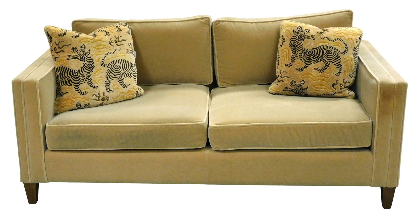 +Contemporary Sofa by Whitehall, c. 1986, upholstered in camel colored plush fabric, two back: +Contemporary Sofa by Whitehall, c. 1986, upholstered in camel colored plush fabric, two back and two seat cushions, square arms, raised on four short tapered wood legs, no maker's tags viewed, sold w