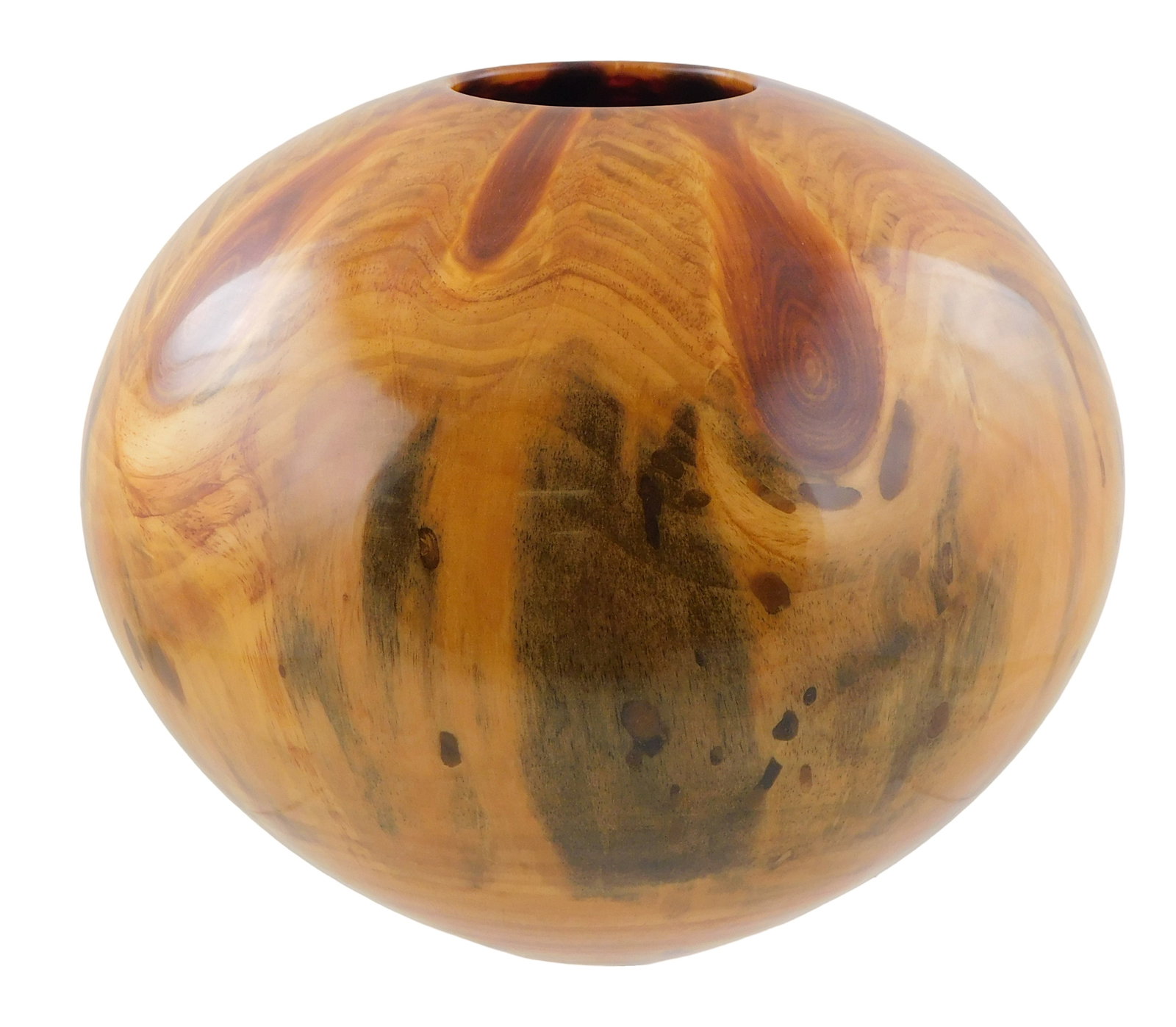 +Philip Moulthrop (American, b. 1947), turned wood vessel, made from white pine node, star-like (1 of 4)