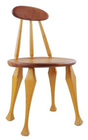 Ron Curtis (American, 20th/ 21st C.) Contemporary design child's chair, hand-carved, oval crest and