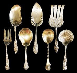 STERLING: Whiting, Gorham, etc., seven ornate serving pieces, including: Durgin "Iris" pattern