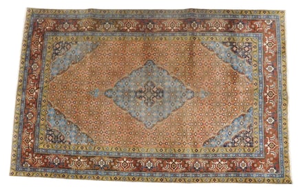 RUG: Bijar carpet, 7' x 10', wool on cotton, rust colored ground, chocolate primary border, mustard