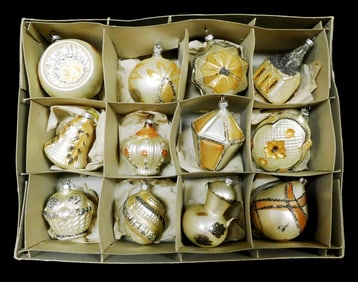 Twelve early glass ornaments, mid-20th C., eleven of twelve ornament caps stamped "West Germany",