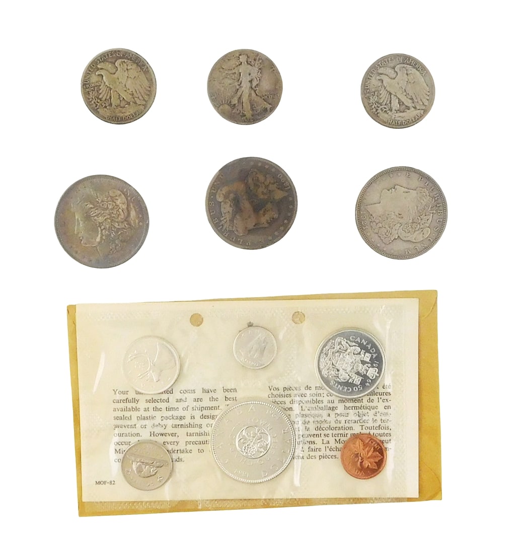 COINS: Lot of coins. Includes Three Morgan dollars - two of which are circulated and one is (1 of 3)