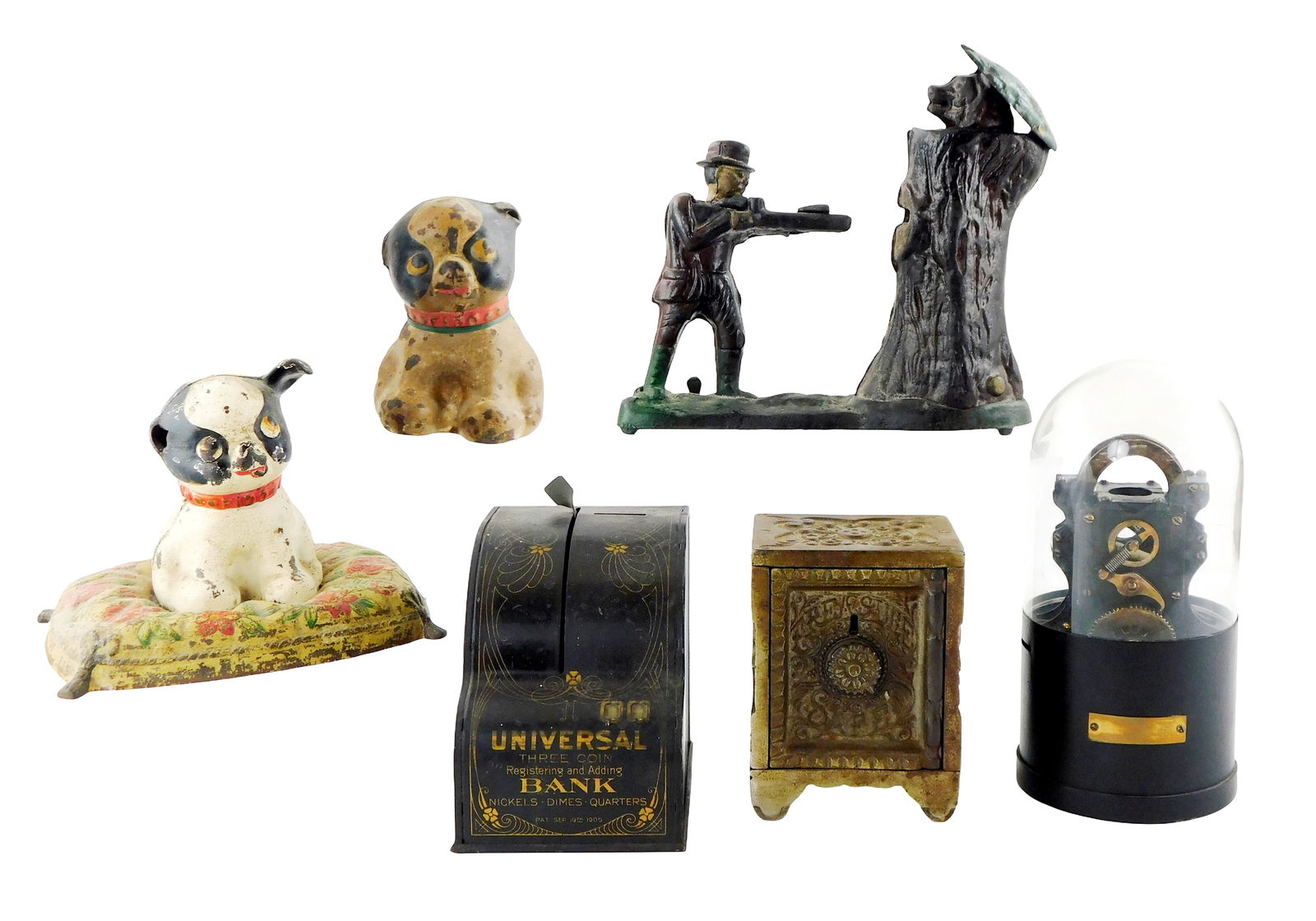 Six metal coin banks, 19th/20th C., including: J. E. Stevens “Treasure?? safe cast iron bank, (1 of 8)