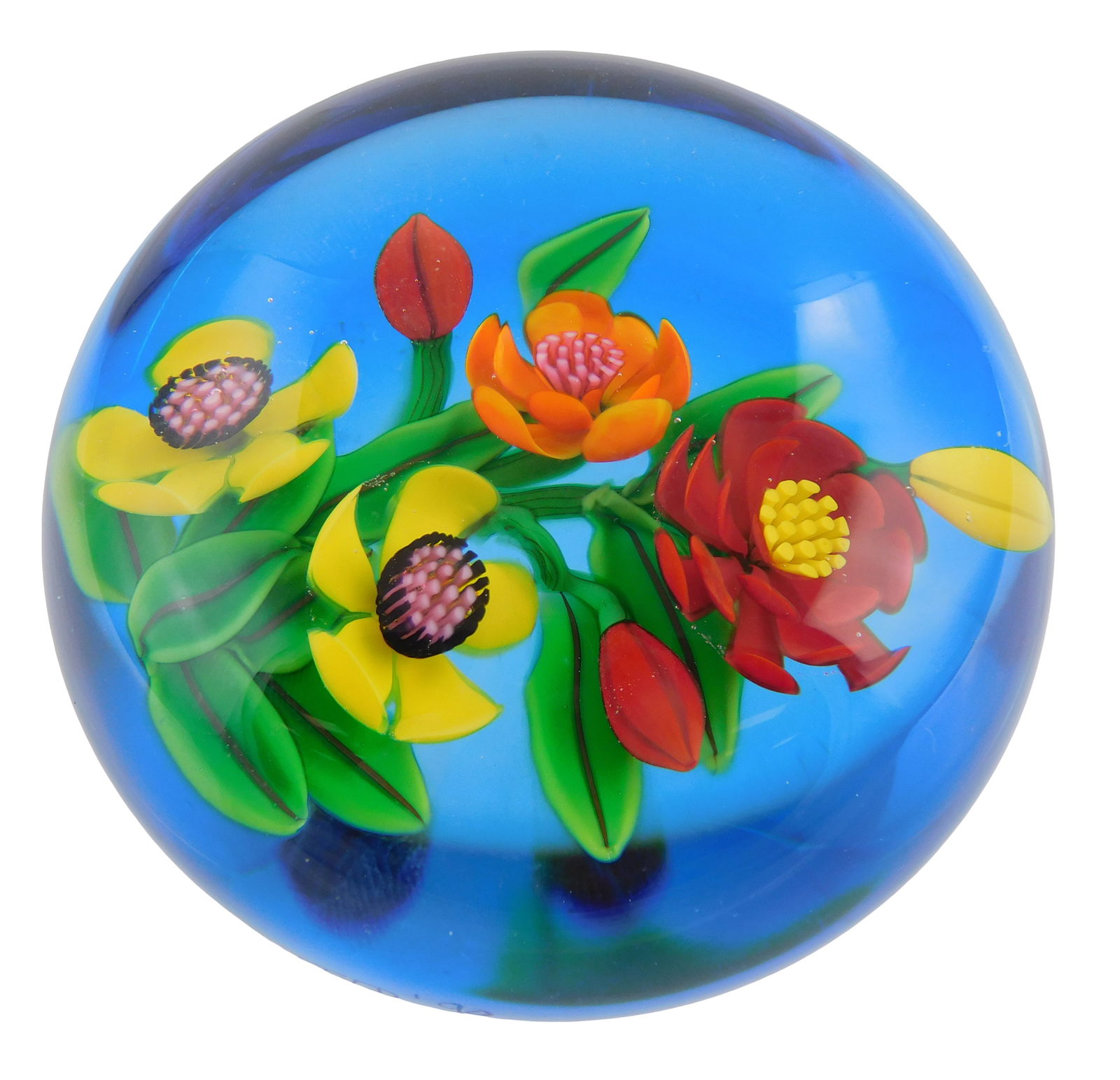 ART GLASS: Ken Rosenfeld (American, b. 1950) studio glass floral paperweight, C. 1990, blue backed: ART GLASS: Ken Rosenfeld (American, b. 1950) studio glass floral paperweight, C. 1990, blue backed floral design with red, yellow and orange blooms, clear orb with blue ground, etched signature and da