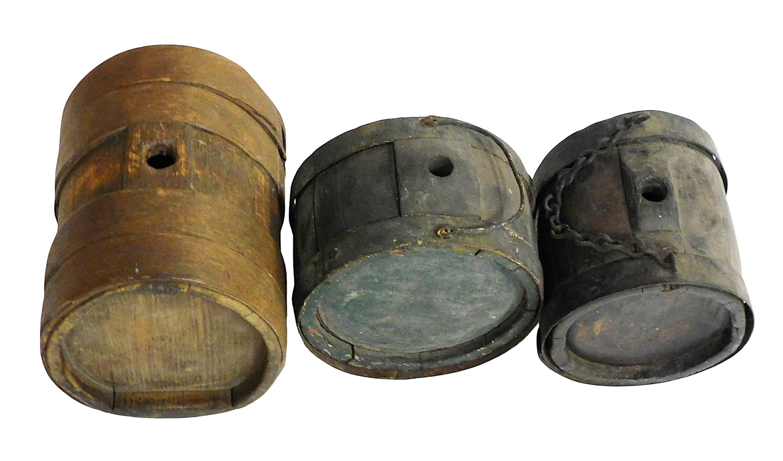 Three coopered canteens, 19th C., tallest with carved letters to top and bottom, smallest with green: Three coopered canteens, 19th C., tallest with carved letters to top and bottom, smallest with green paint, other with metal chain intact, wear on all consistent with age and use, medium one with loos
