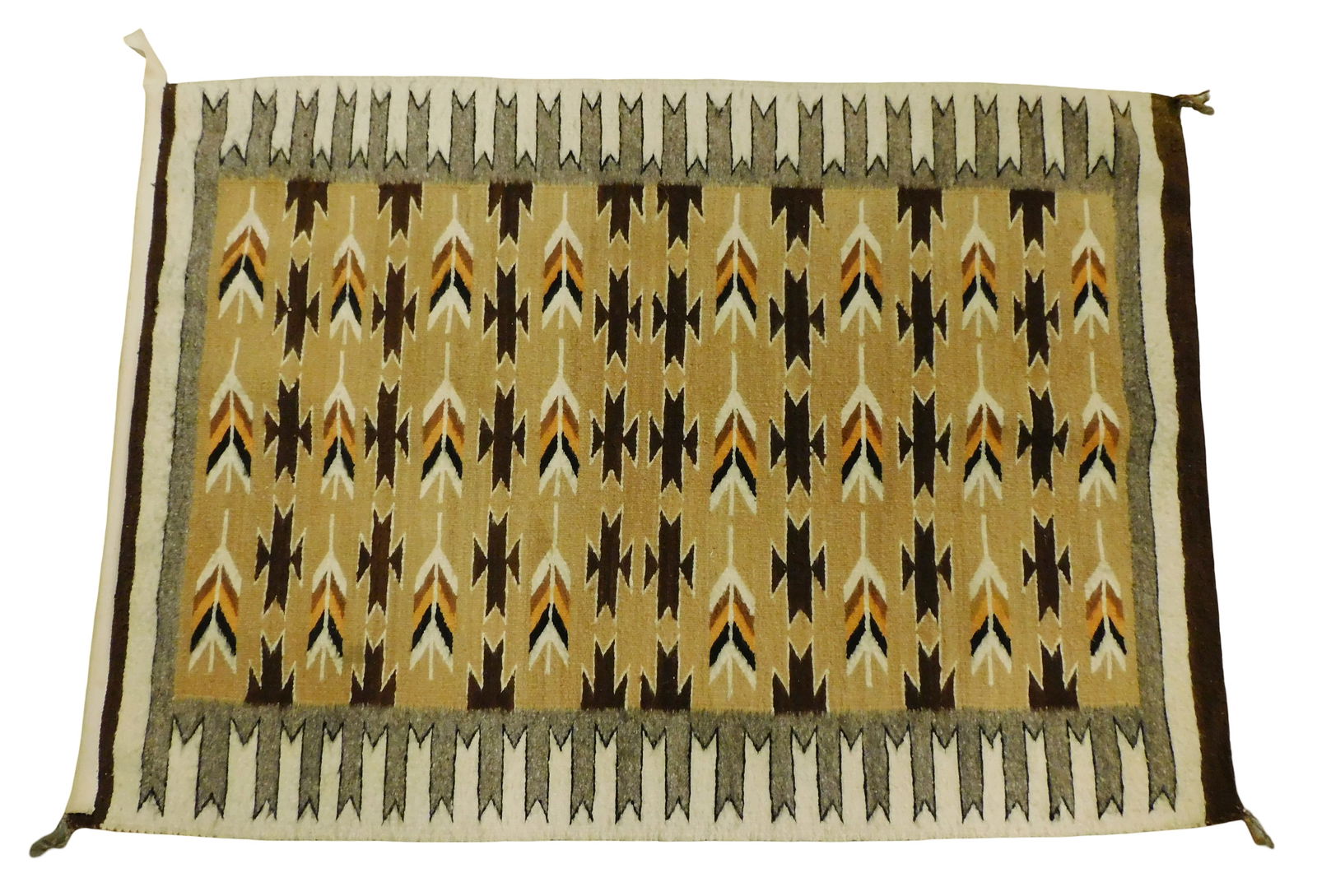 RUG: Navajo Chinle style flatweave, 52" x 27", hand-woven, wool on wool, brown, tan and cream,: RUG: Navajo Chinle style flatweave, 52” x 27”, hand-woven, wool on wool, brown, tan and cream, striped bands of geometric patterns, wear consistent with age and use including edge wear, ru
