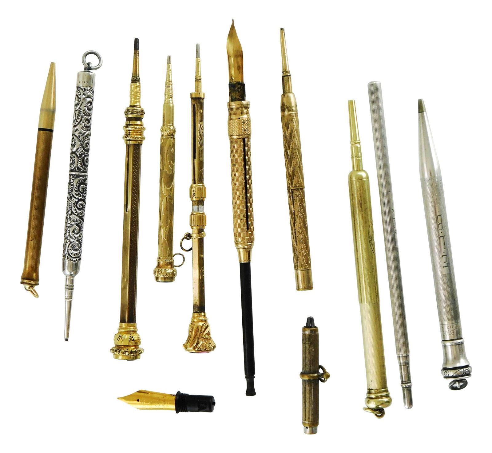 ACCESSORIES: Gold, sterling, etc. writing instruments, twelve pieces, including: one tested 10K (1 of 4)