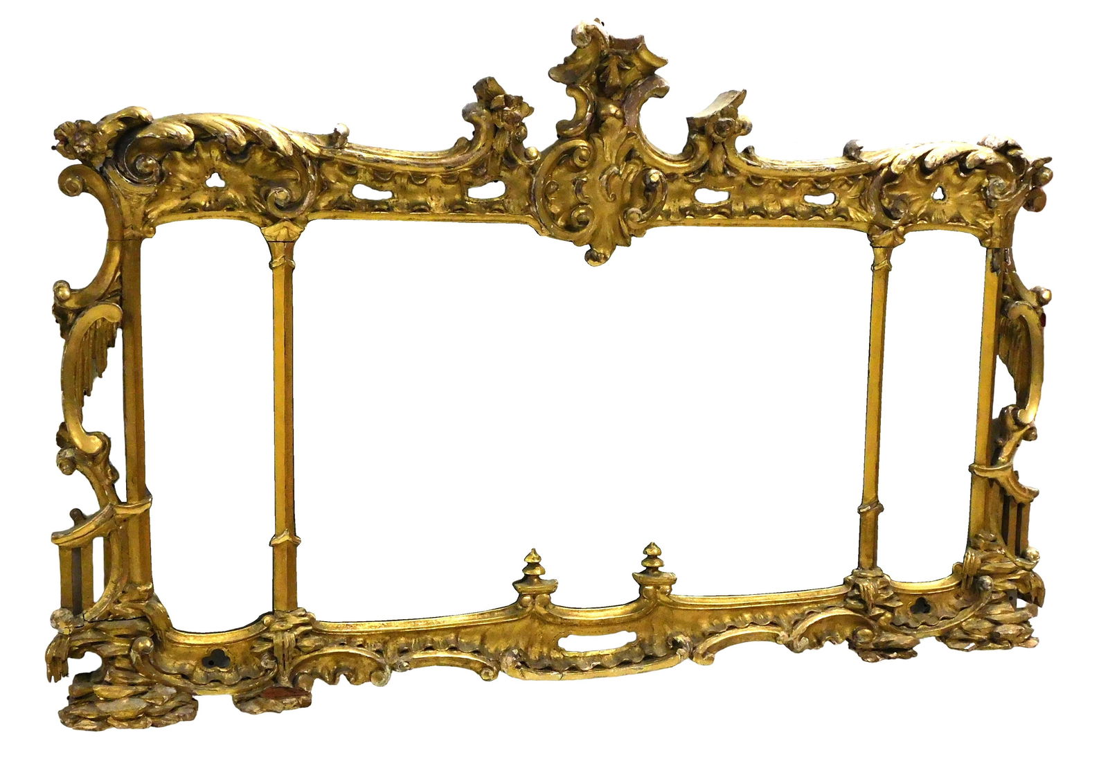 Chippendale over-mantel mirror, 18th C. English, heavily carved and gilt pierced frame with spirals: Chippendale over-mantel mirror, 18th C. English, heavily carved and gilt pierced frame with spirals and c-curls, large center glass with side glasses, wear consistent with age and use, scattered chips
