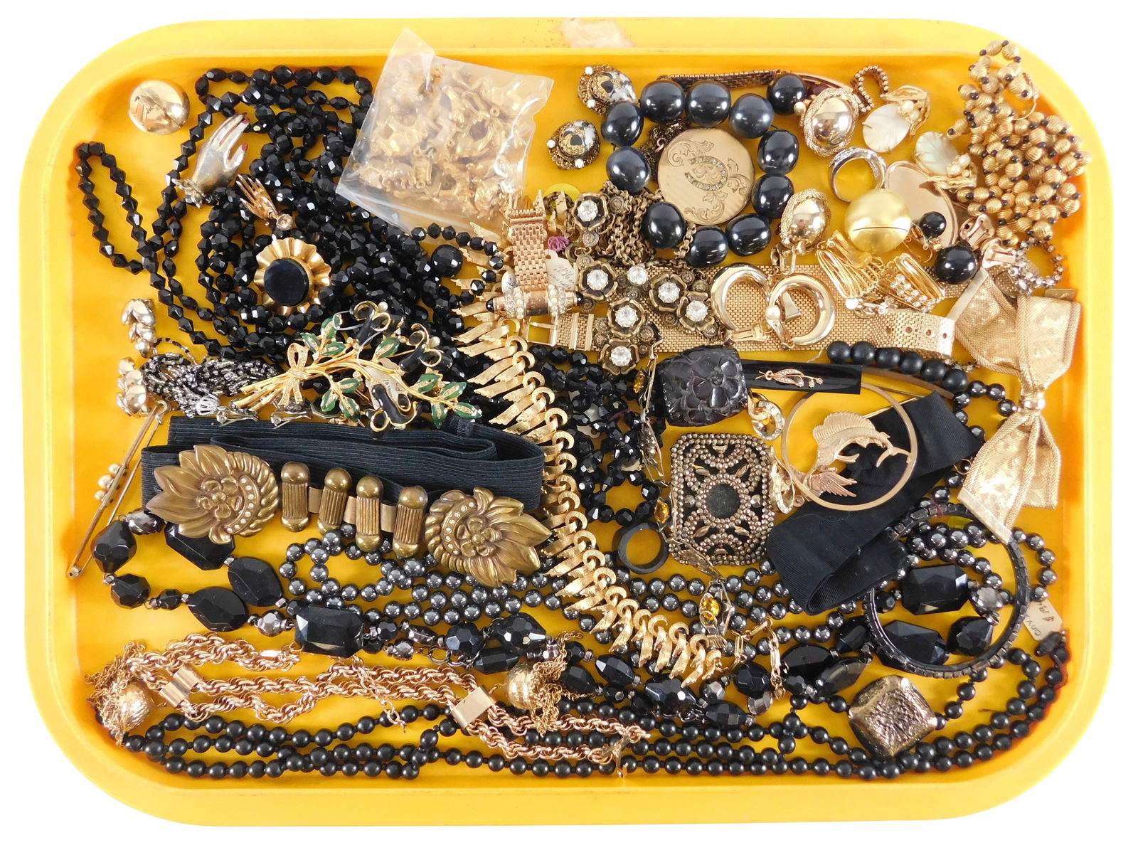 COSTUME JEWELRY: Trifari, Hobe, Bartek, etc., 40+ pieces, most black and gold themed, many early: COSTUME JEWELRY: Trifari, Hobe, Bartek, etc., 40+ pieces, most black and gold themed, many early Victorian, materials include gold-plate, gold-tone, beaded, faceted clear and colored stones, etc., ite
