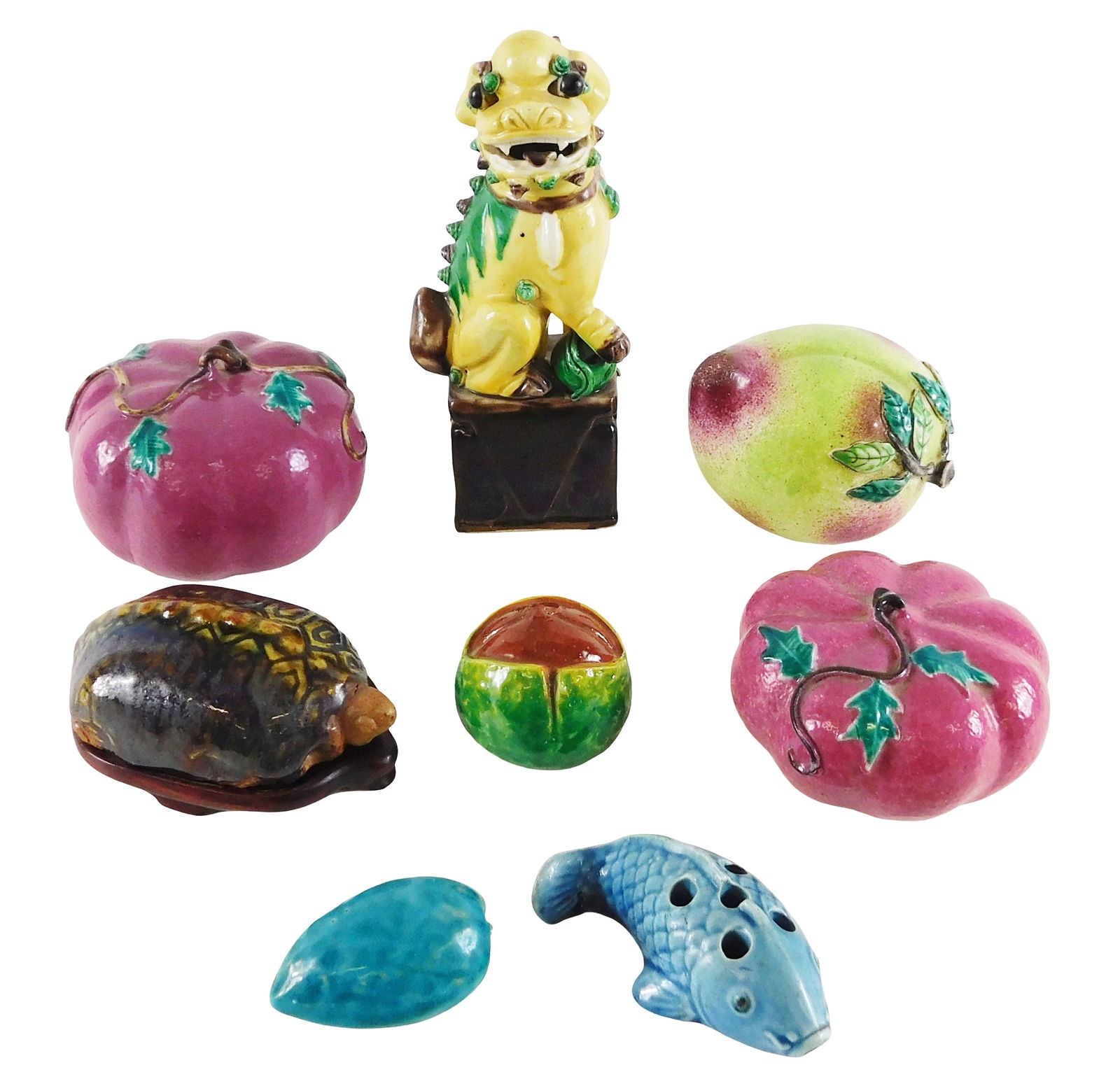 ASIAN: Eight pieces of Asian ceramic animal figures and fruits, 19th-20th C., including: ceramic: ASIAN: Eight pieces of Asian ceramic animal figures and fruits, 19th-20th C., including: ceramic Buddhist lion (foo dogs), sancai glaze, some pitting of glaze, 8 1/2” h.; ceramic and clay turtle