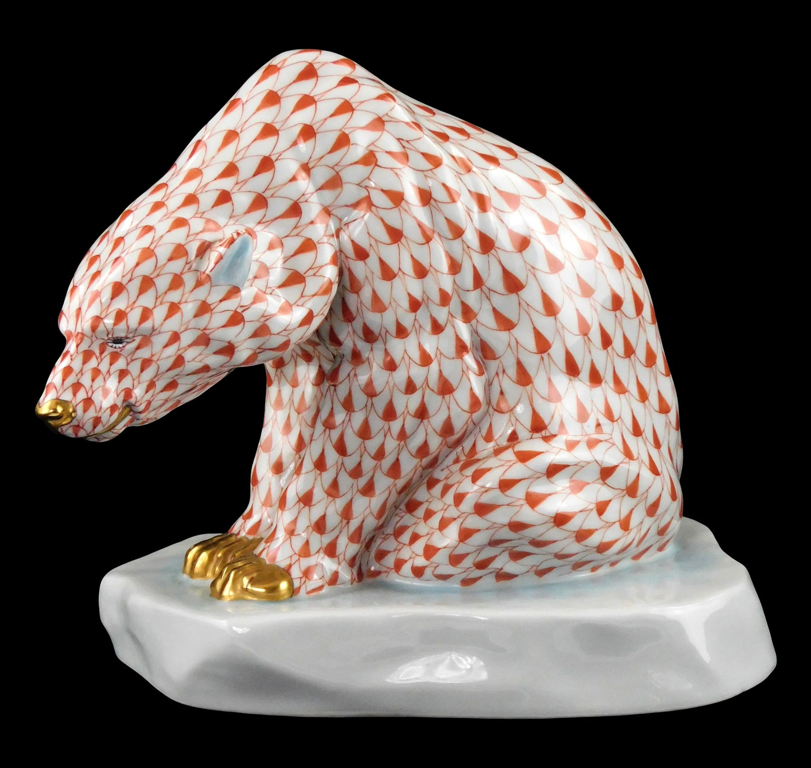 Herend hand-painted porcelain seated polar bear figure, 20th C., Hungary, no. 5367, decorated with: Herend hand-painted porcelain seated polar bear figure, 20th C., Hungary, no. 5367, decorated with red fishnet pattern and gilt accents, originally designed by Markup Bela in 1927, stamped on base "Ma