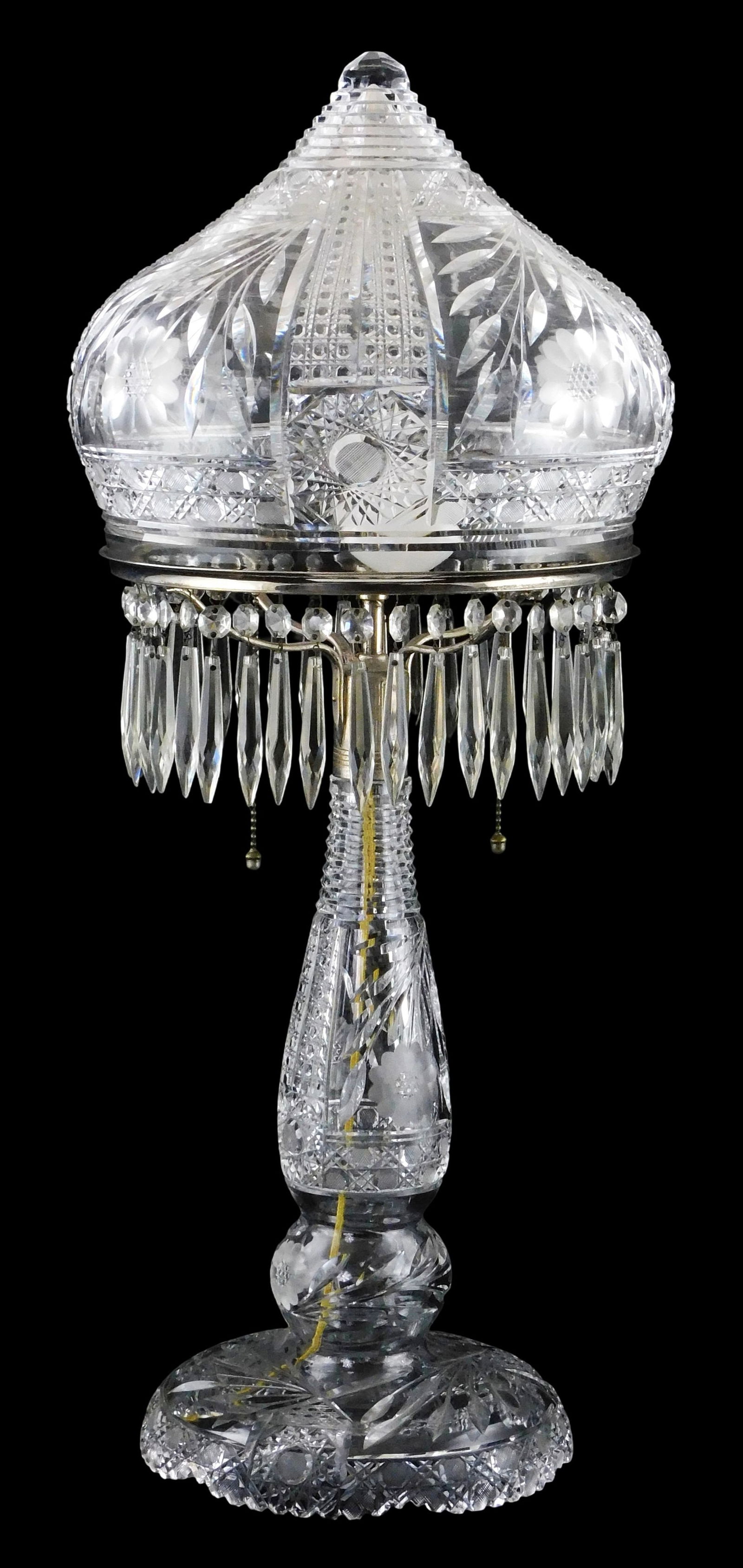 GLASS: American brilliant cut table lamp, c. 1900-1915, lead crystal, removable strawberry dome form: GLASS: American brilliant cut table lamp, c. 1900-1915, lead crystal, removable strawberry dome form shade, floral, star and hobnail cut, shade supported on white metal frame with cut crystal prism da