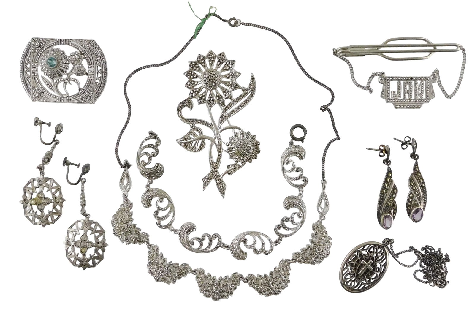 JEWELRY: Eight pieces of sterling and marcasite jewelry, including three pins; two pair of earrings, (1 of 3)