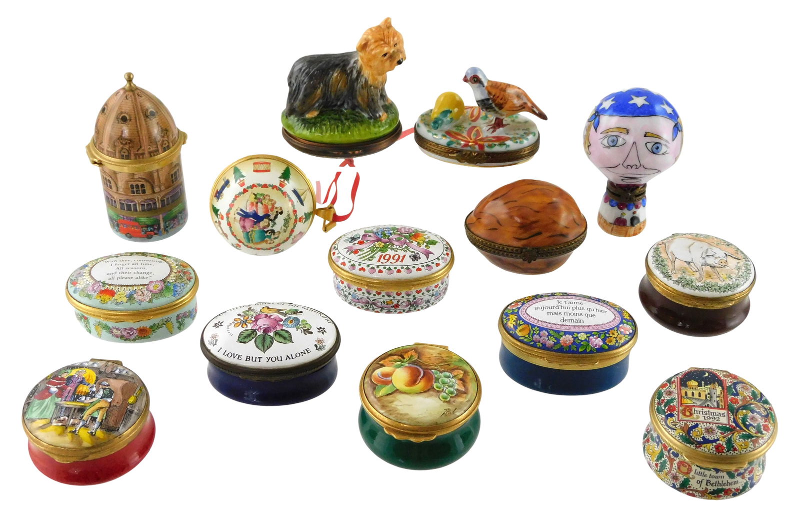 Fourteen enamel hinged trinket or pill boxes, varying themes, makers include: Limoges, Halcyon Days, (1 of 5)
