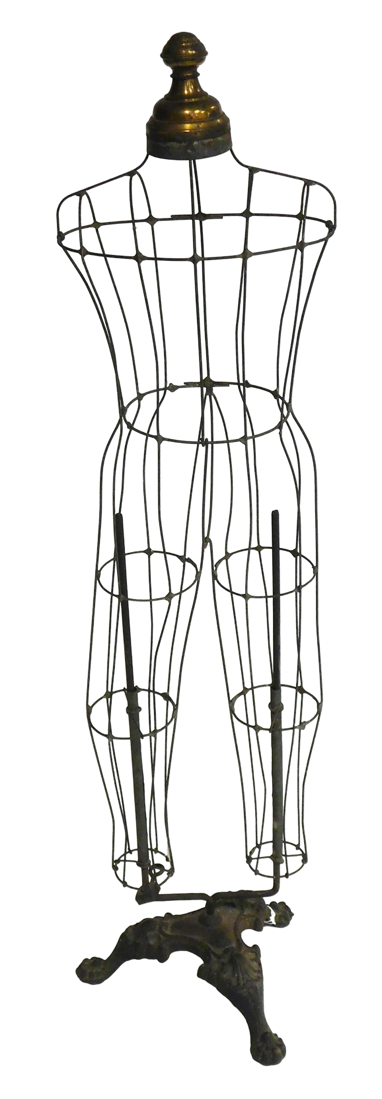 Children's wire dress or clothes form display, late 19th- early 20th C., metal wire clothes or dress: Children's wire dress or clothes form display, late 19th- early 20th C., metal wire clothes or dress form in mannequin shape, cast iron tripod base with ornate decoration, two support rods extend in '