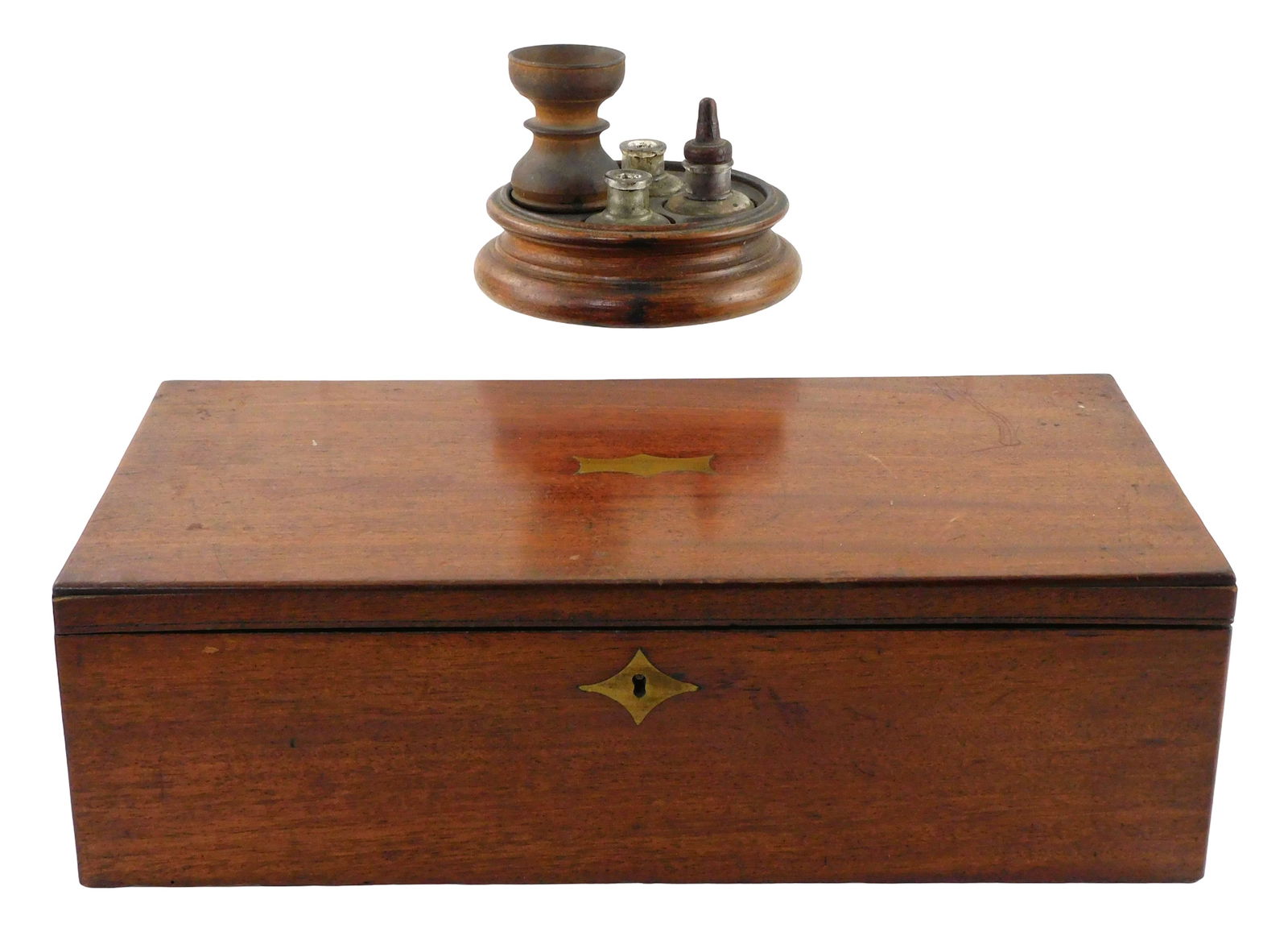 Lap desk and turned inkstand, including: lap desk with inset brass handles, medallion, lock: Lap desk and turned inkstand, including: lap desk with inset brass handles, medallion, lock medallion, interior with one fitted glass inkwell and other compartments, fabric-lined writing surface opens