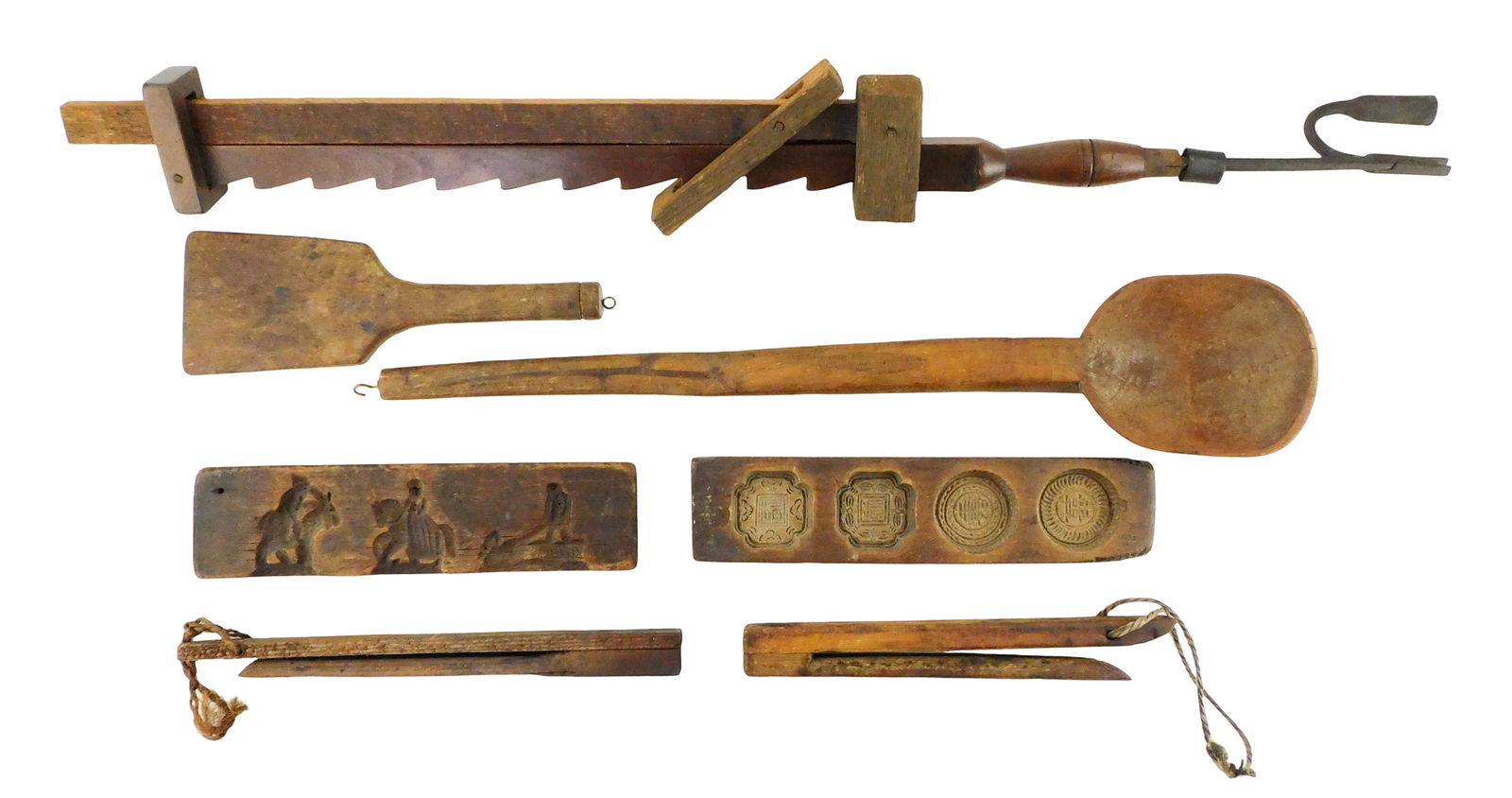 Springerle mold boards, rush light and treenware, seven pieces, 19th C., including: treenware long: Springerle mold boards, rush light and treenware, seven pieces, 19th C., including: treenware long handled spoon, marked ”V” on back, cracks on spoon face, 22 3/4” l., treenware smal