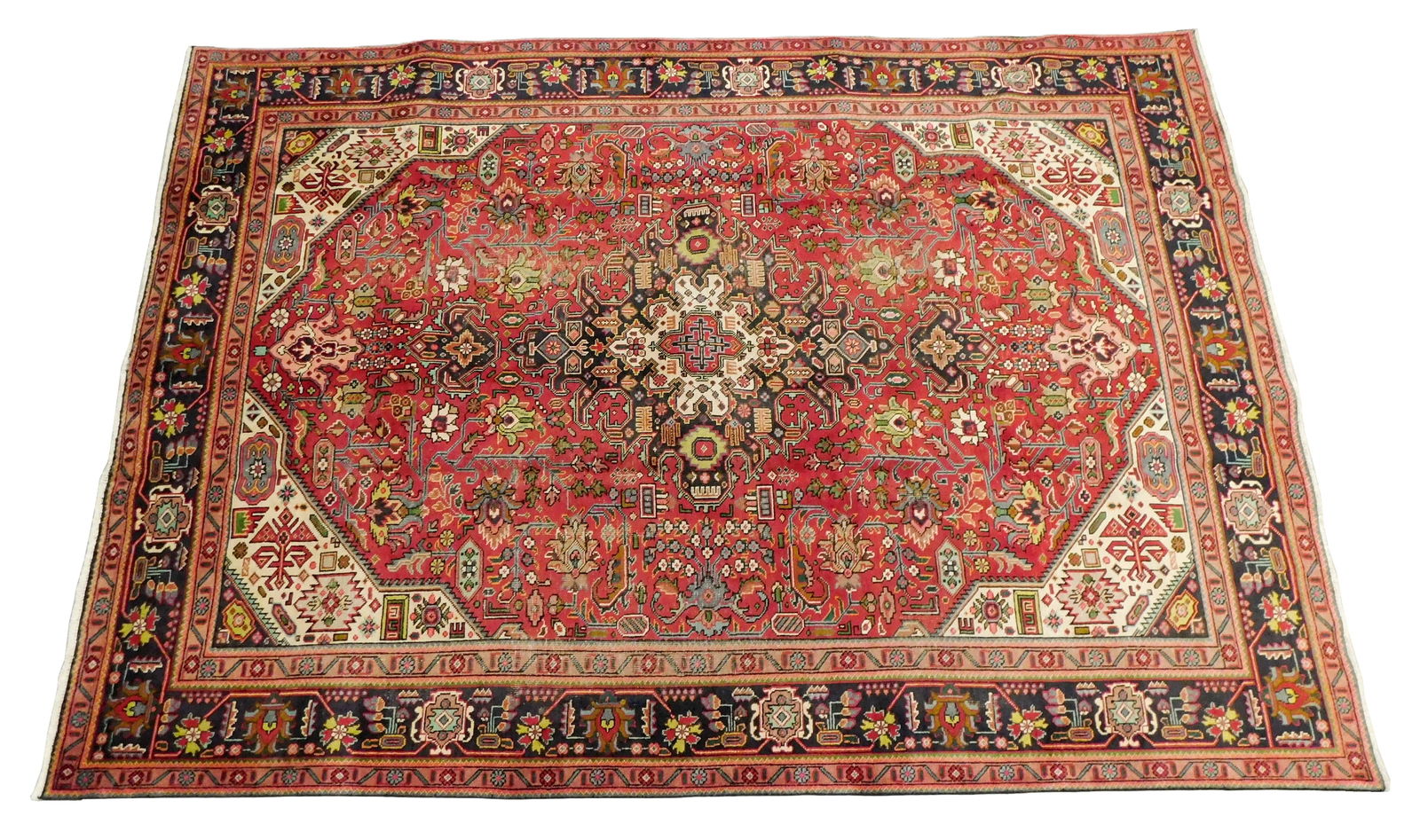 RUG: Tabriz, 9' x 12', wool on cotton, allover floral vine design on red field, polychrome accents, (1 of 5)