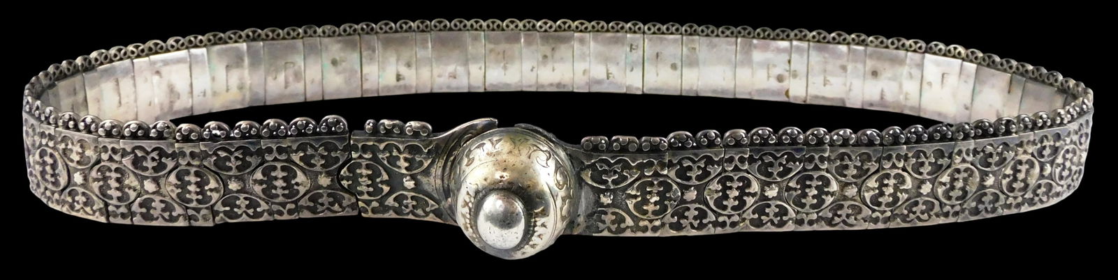 SILVER: Imperial Russia "Tsar" belt, 84 silver, over 60 decorated links on leather, most links with: SILVER: Imperial Russia "Tsar" belt, 84 silver, over 60 decorated links on leather, most links with indistinguishable hallmark, wear consistent with age including patina, 30" long. [Total Weight inclu