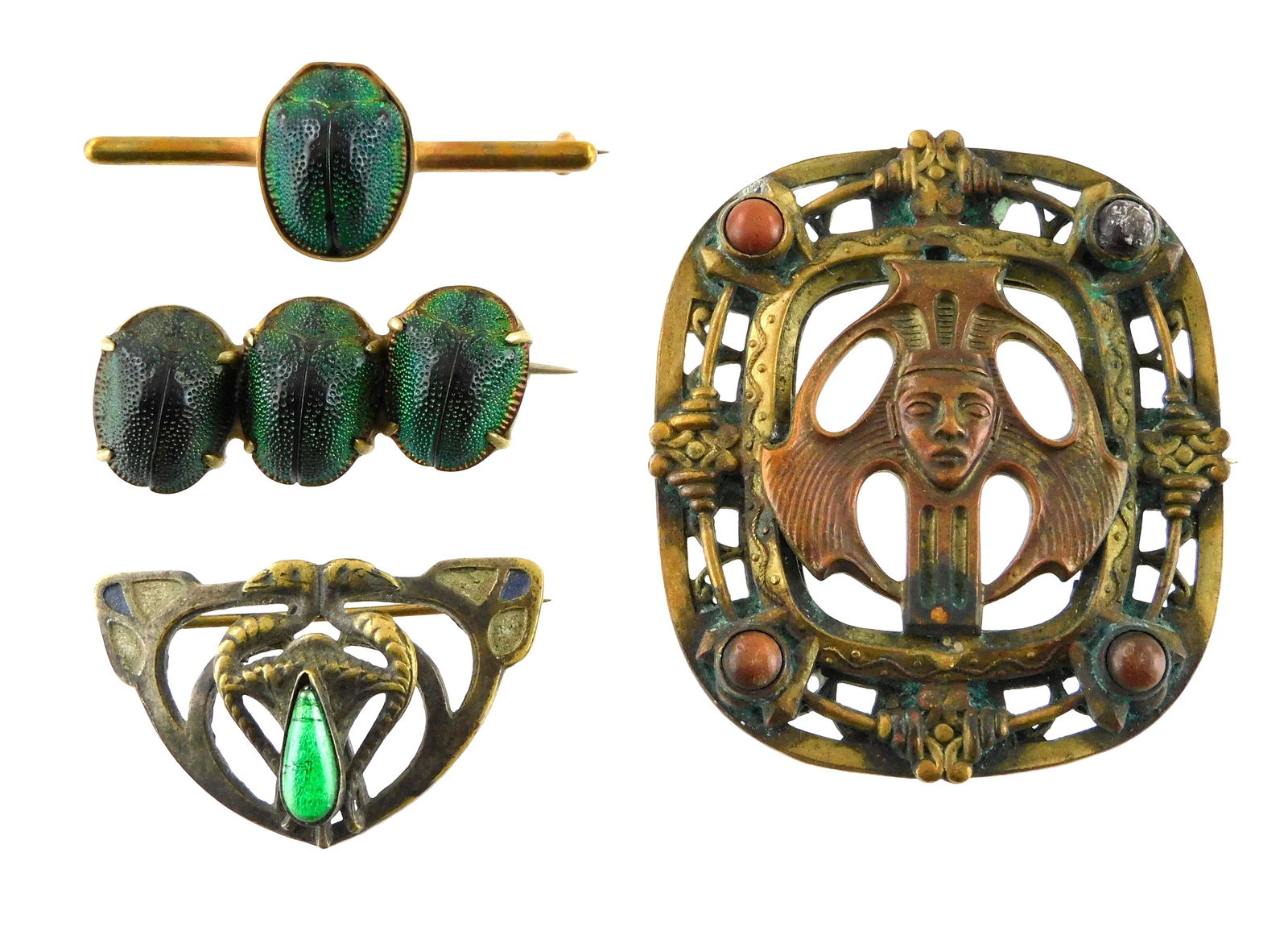COSTUME JEWELRY: Four Egyptian Revival brooches, early 20th C., including: two bar pins with real: COSTUME JEWELRY: Four Egyptian Revival brooches, early 20th C., including: two bar pins with real scarab beetles, one a single and one a row of three, these iridescent bug brooches were fashionable c.