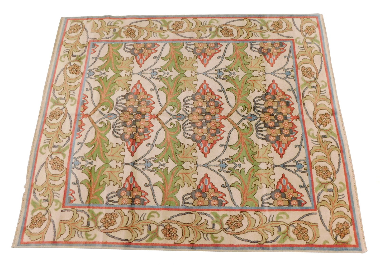 RUG: Williams Morris style carpet, 8' x 9' 9", wool on cotton, repeating stylized floral design on: RUG: Williams Morris style carpet, 8' x 9' 9", wool on cotton, repeating stylized floral design on cream ground, wear consistent with age and use.