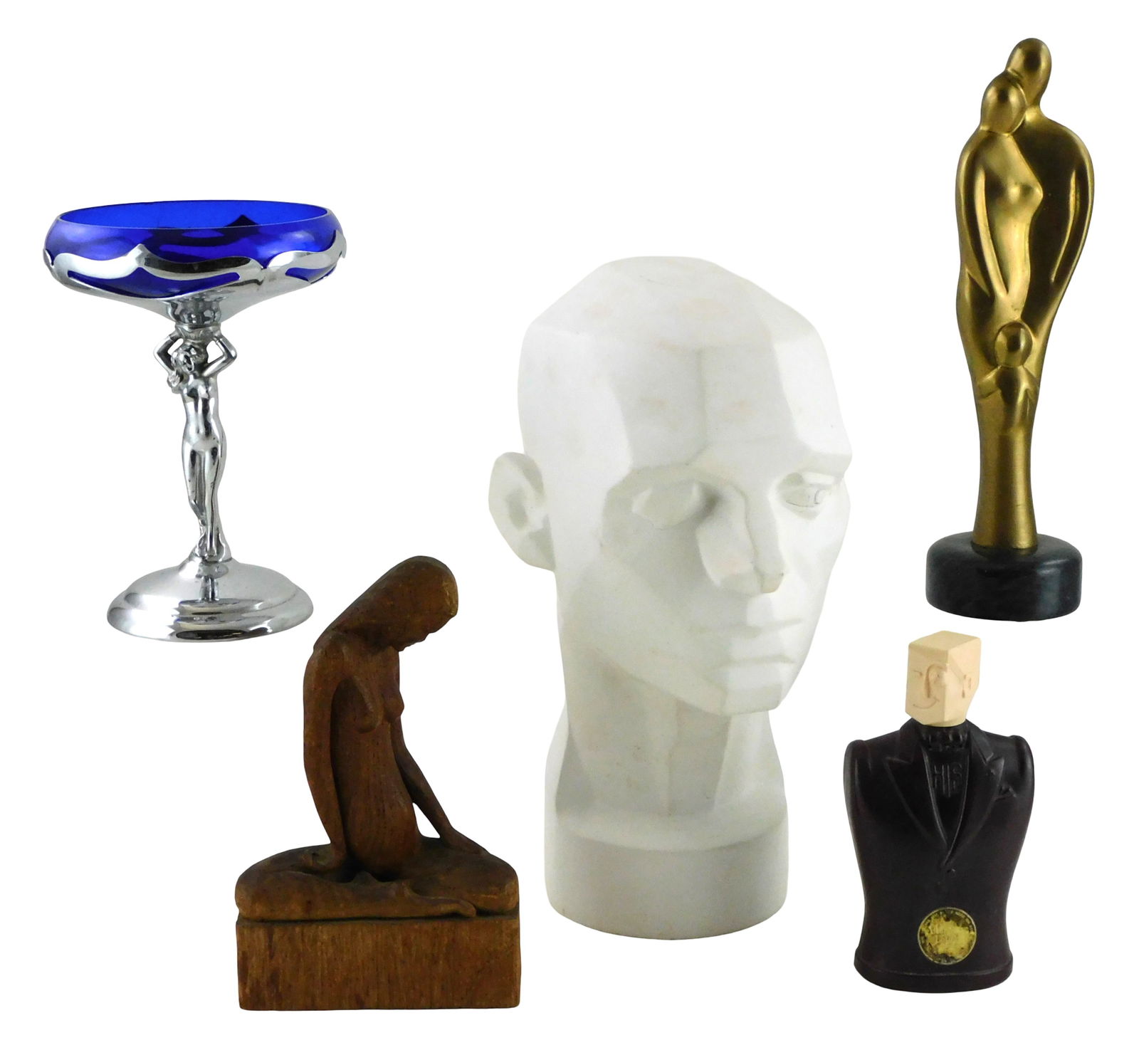 Five figural sculptures and functional pieces, 20th C., including: “Planes of Head?? ceramic (1 of 6)