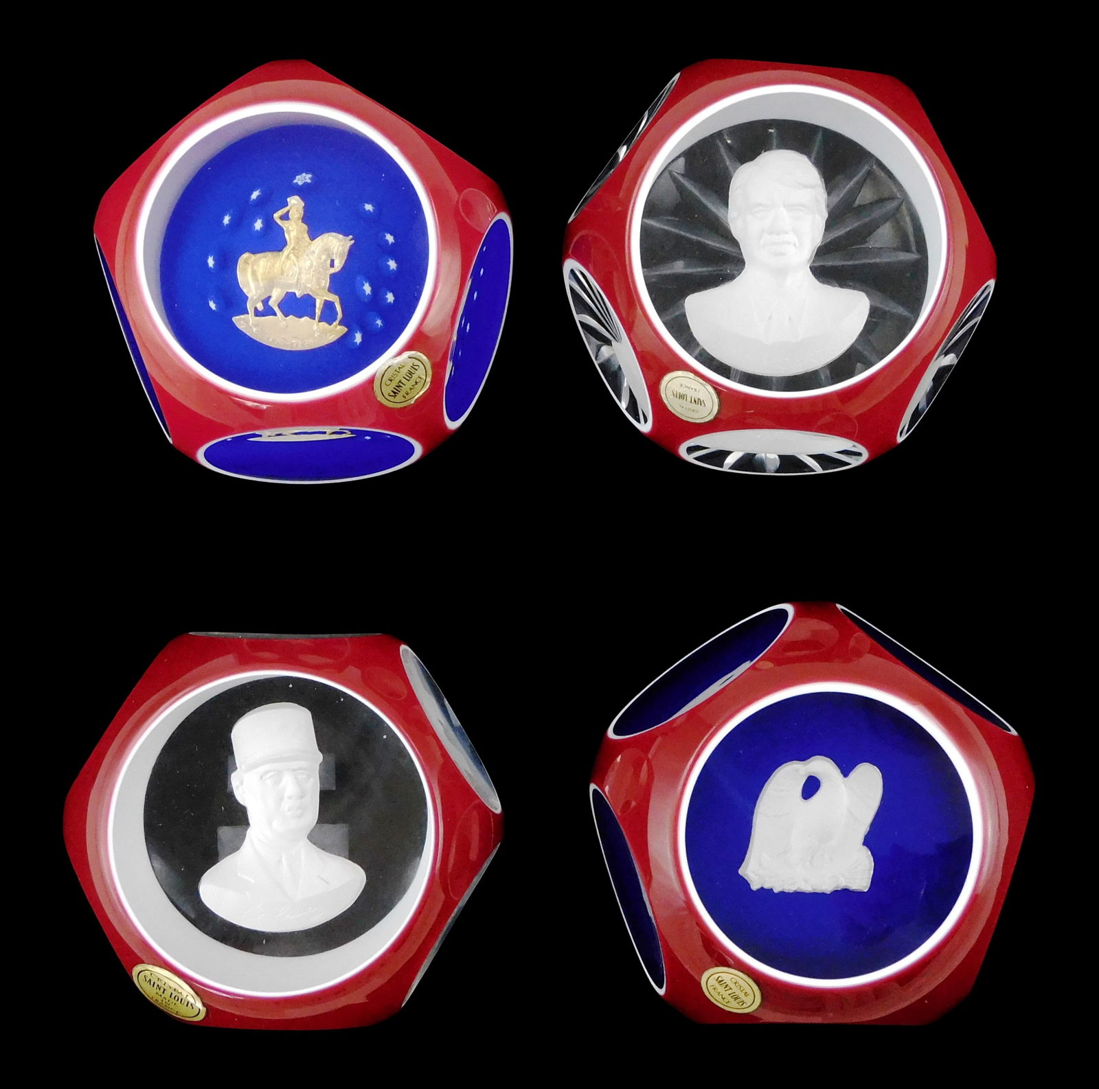 ART GLASS: St. Louis crystal and sulphide paperweights, 20th C., France, all with makers stickers: ART GLASS: St. Louis crystal and sulphide paperweights, 20th C., France, all with makers stickers affixed to side, red overlay, top facet, including: Charles de Gaulle, six side facets, etched symbol